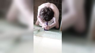 A BOY CAUGHT HIDDENLY SUCKING A DILDO