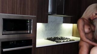 Busty ebony shemale rails a dude in the kitchen